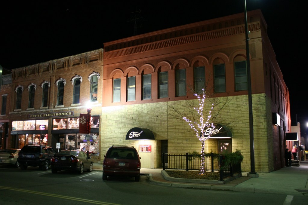 Lights adorn trees in the downtown including next to the Signature Bar & Grill, Faribault's version of "Cheers." Here you'll find, in my opinion, the best pizza in town.