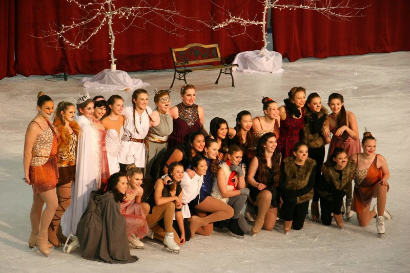 Skaters pose for photos after presenting The Chronicles of Narnia.