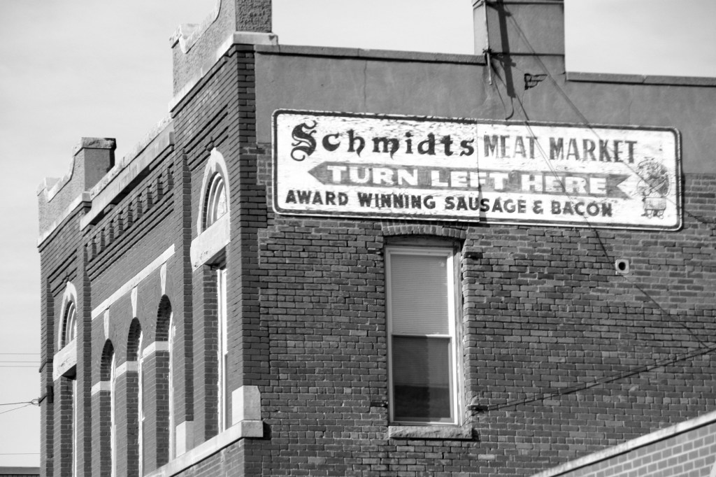 Travel, Minnesota Highway 99 Schmidt Meat Market sign in Nicollet