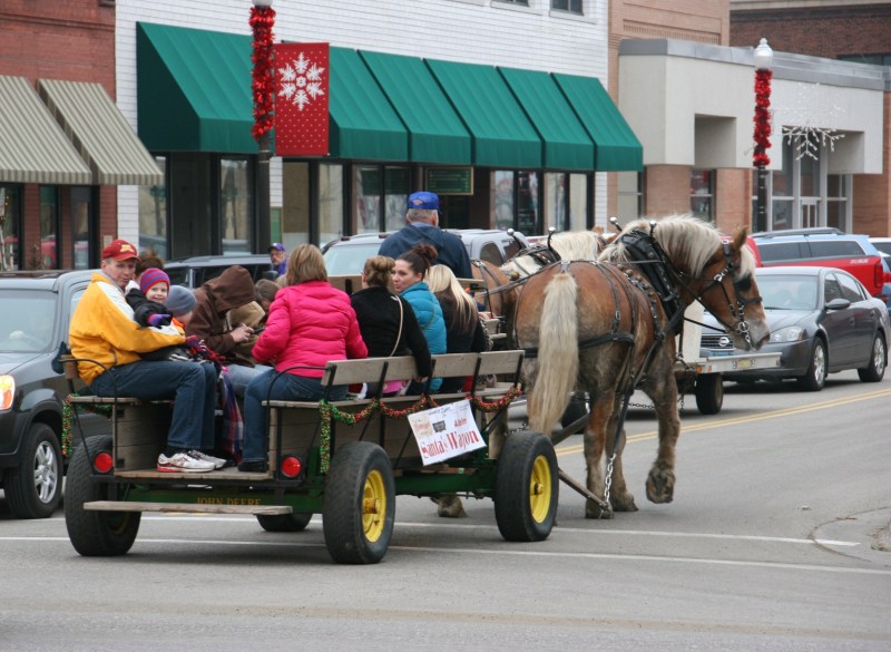 That's Lyla's mom in the hot pink jacket. Lyla is seated to her right.
