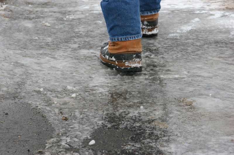 Nature Center, 17 walking across icy parking lot