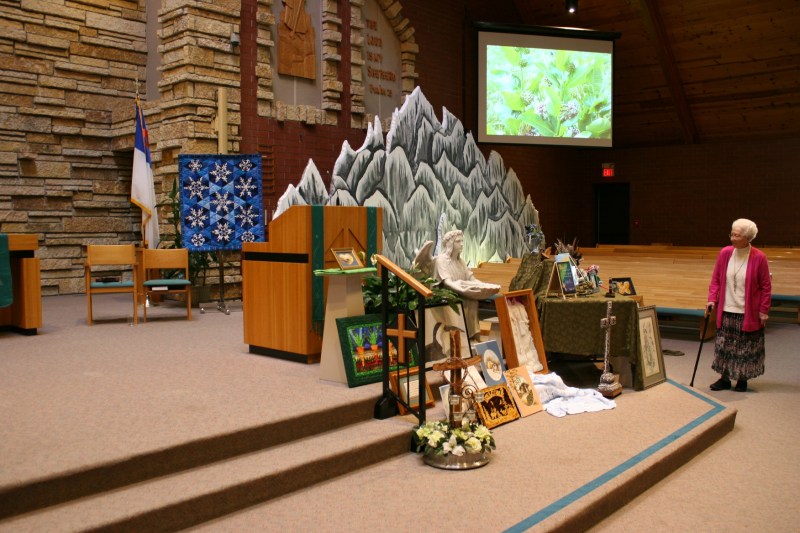 Viewing the art after the 8 a.m. worship service.