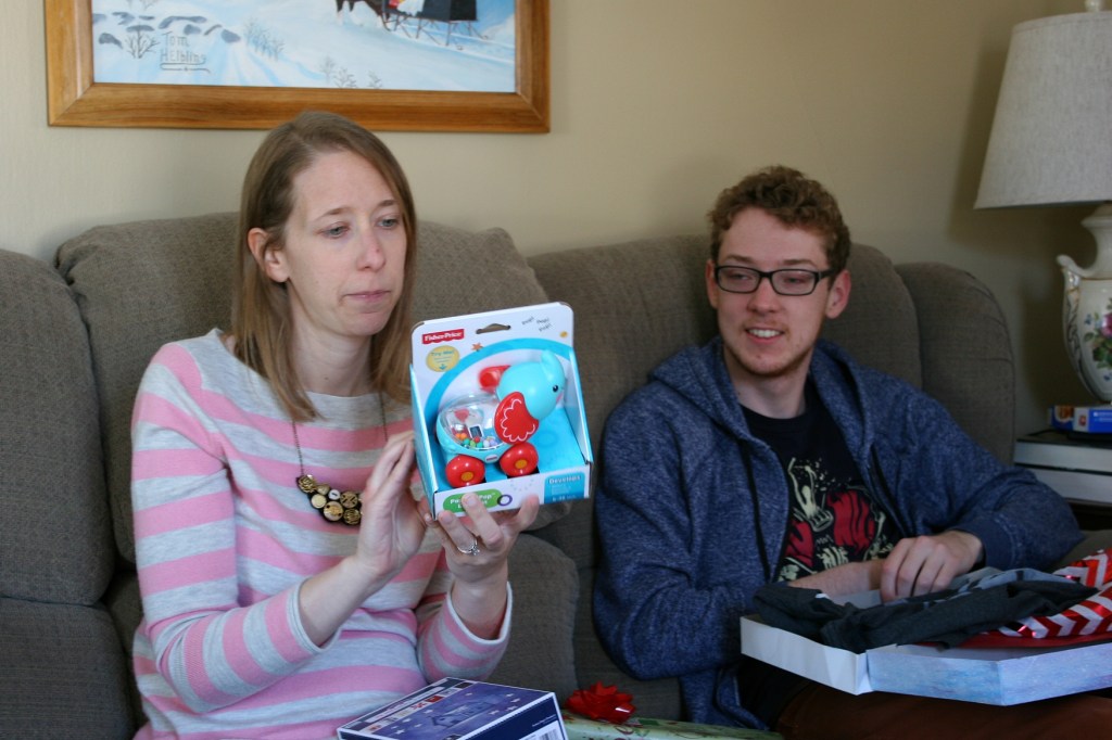 My oldest daughter and my son, celebrating our family Christmas on New Year's weekend. The elephant toy is for the new baby