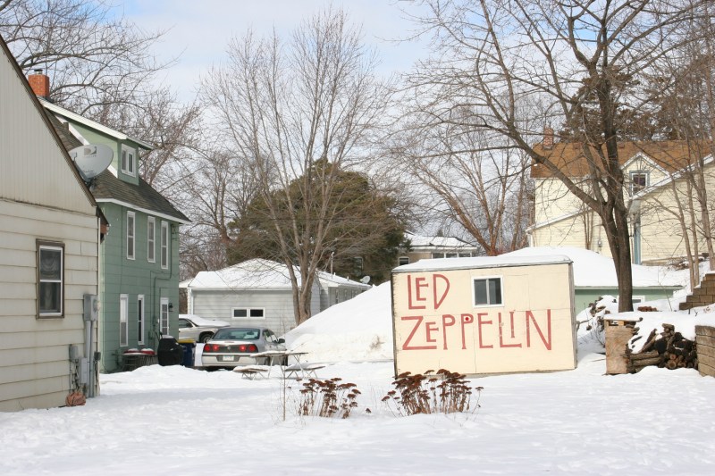 The rock band name on this shed leaves the unanswered question, "Why?"