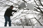 Shoveling snow off roof,&nbsp;67