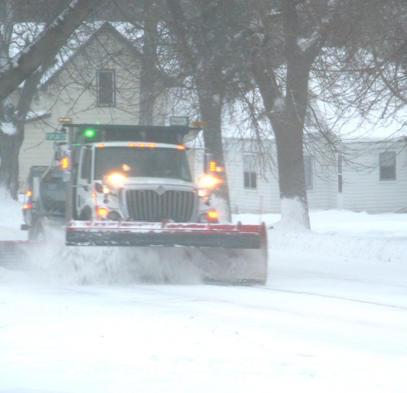 A City of Faribault truck plows snow on the street past my house Tuesday afternoon.