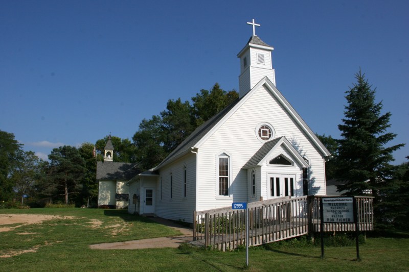 Weaver United Methodist Church with the historic former schoolhouse next door.