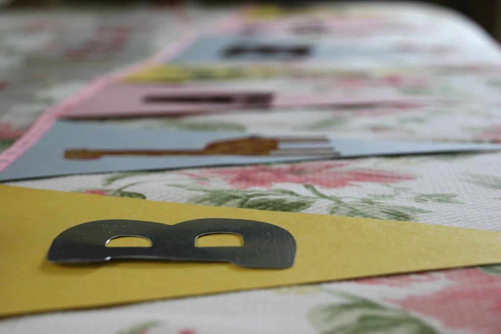 I designed a BABY banner to hang in my living room. Here it lies on the bed in a spare bedroom.