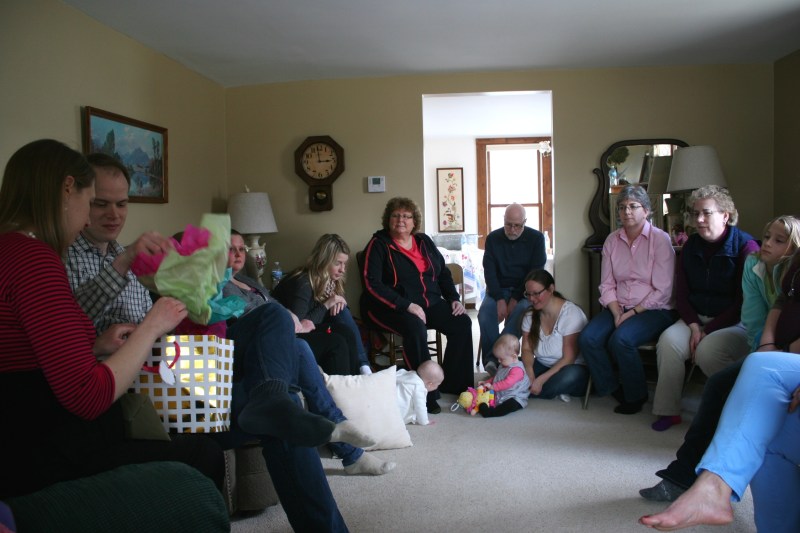 A snippet shot of guests gathered in my living room for gift opening at the baby shower.