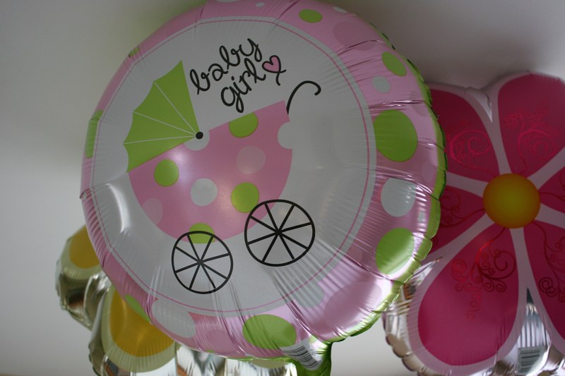 I picked up three helium balloons for my daughter and son-in-law's baby shower for a total of $3 at Dollar Tree.