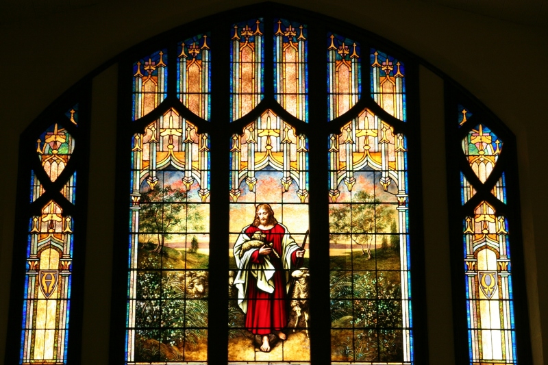 Stained glass windows fill the sanctuary, including this one in the balcony.