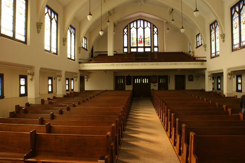 Looking from the front of the sanctuary to the rear and the balcony.