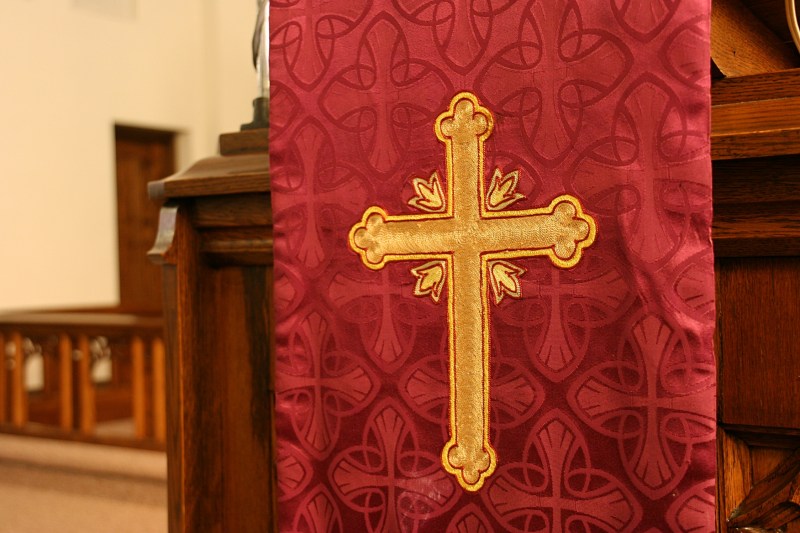 Hanging from the pulpit.