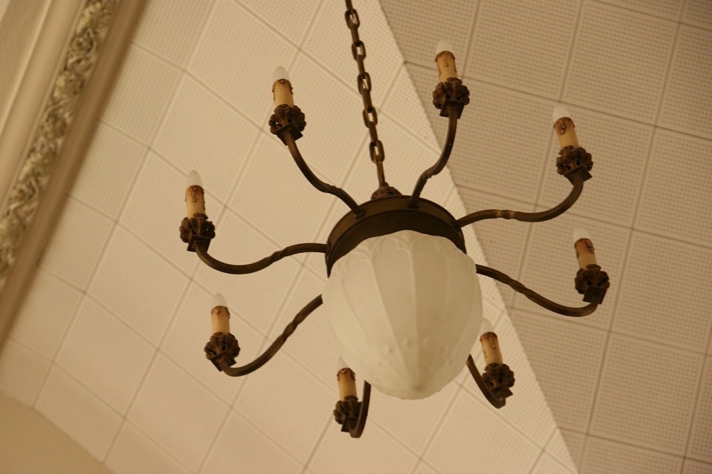 I assume this is an original vintage light suspended in the sanctuary.