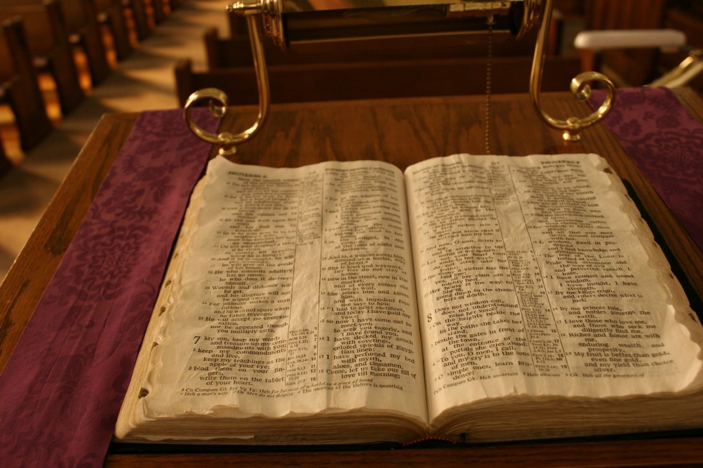 This bible, lying open on the lectern, was turned to