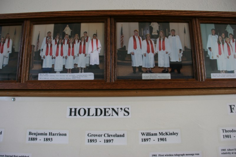 Confirmation photos hang above a history timeline.
