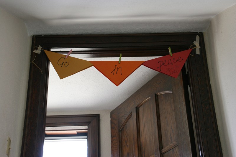 A simple banner message for those exiting the church entry to the south.