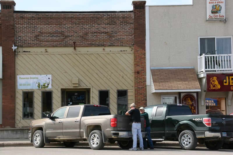 Visiting early Saturday afternoon in downtown Wanamingo.