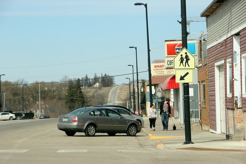Walking the puppy in downtown Wanamingo.