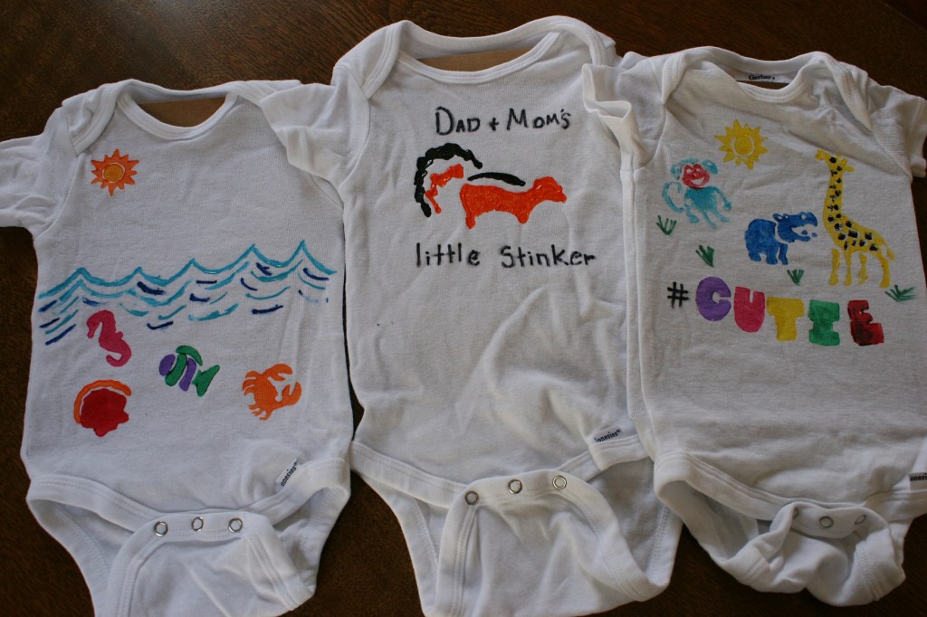 A niece created the ocean themed onesie on the left.