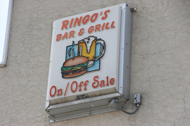 Small town Wanamingo, 38 Ringo's sign above bar