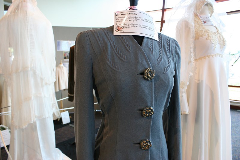 The bride wore a blue grey wool suit at her 1944 wedding.