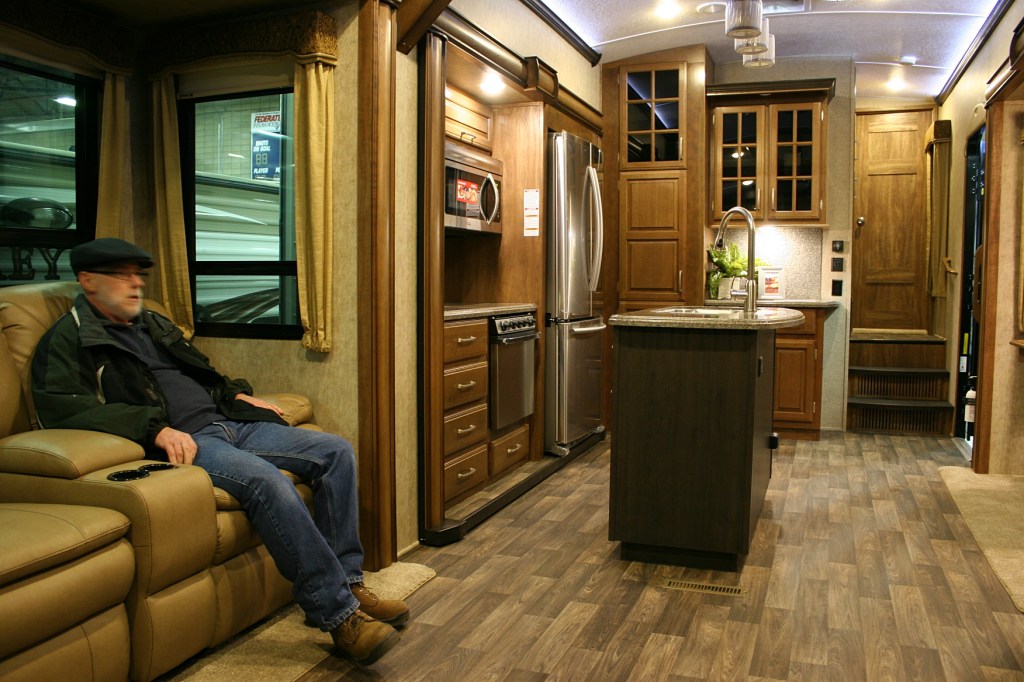 If he could have, Randy would have kicked back with a beer, watched TV and fallen asleep inside this comfy motorhome.