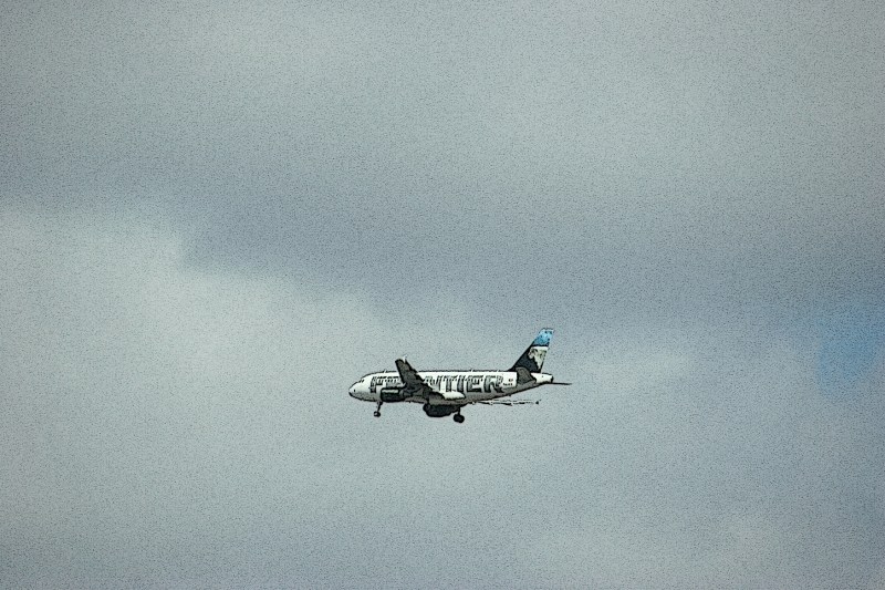 I could imagine the loved ones awaiting the arrival of this Frontier jetliner.