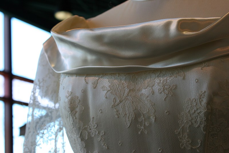 An illusion neckline drapes on a 1949 bridal gown.