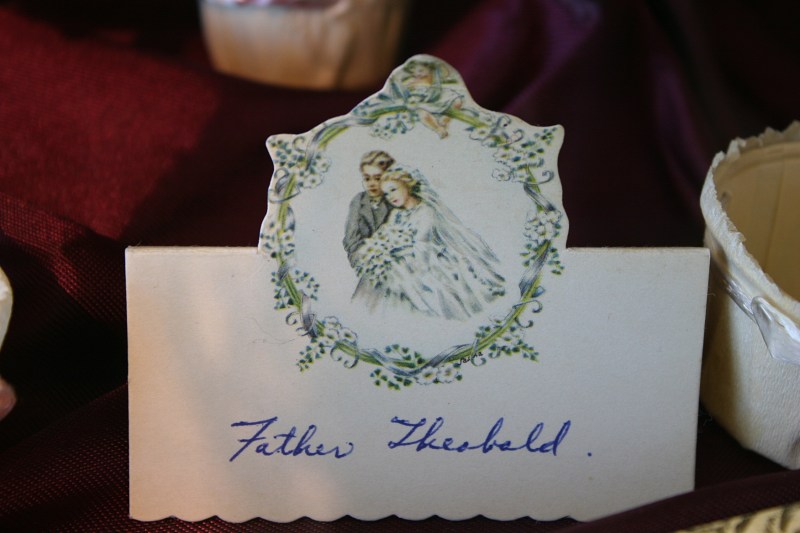 A name place card is among items displayed.