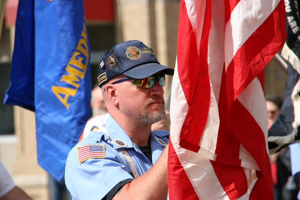 Parade, 12 flag bearer