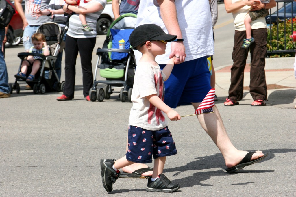 Parade, 34 little boy with flag