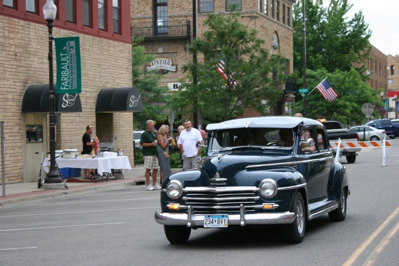 A vintage Plymouth cruises onto Central.