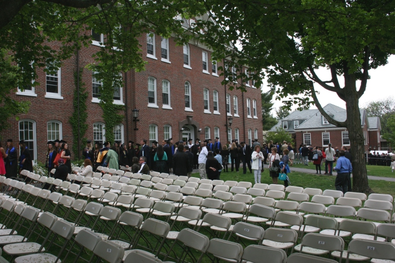 Thousands of chairs covered the campus green for commencement. The event went on, rain or shine. Rain drizzled briefly.