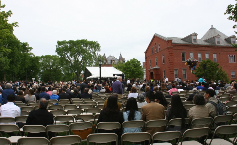 The tented area in the background served as the stage during the all-school commencement ceremony.