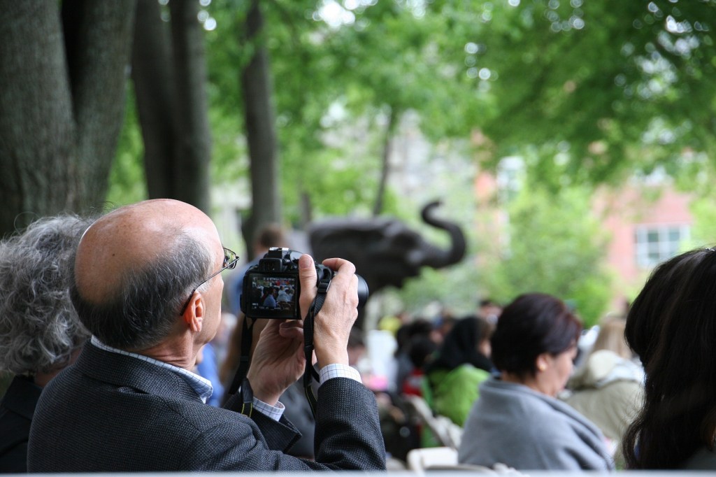 Lots of photos were taken at the ceremony and of Tufts' mascot Jumbo, in the background here.