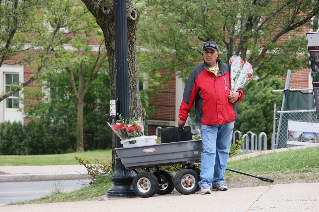 Vendors hawked flowers before and after commencement ceremonies.