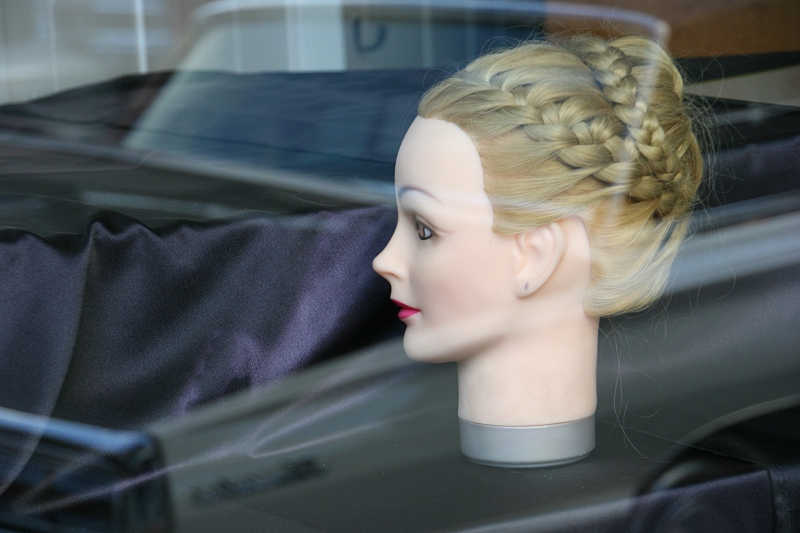 While photographing vehicles, I noticed the truck reflection in the storefront window of a hair salon.