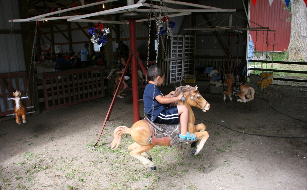These vintage plastic jumpy horses were repurposed decades ago into a carnival ride.