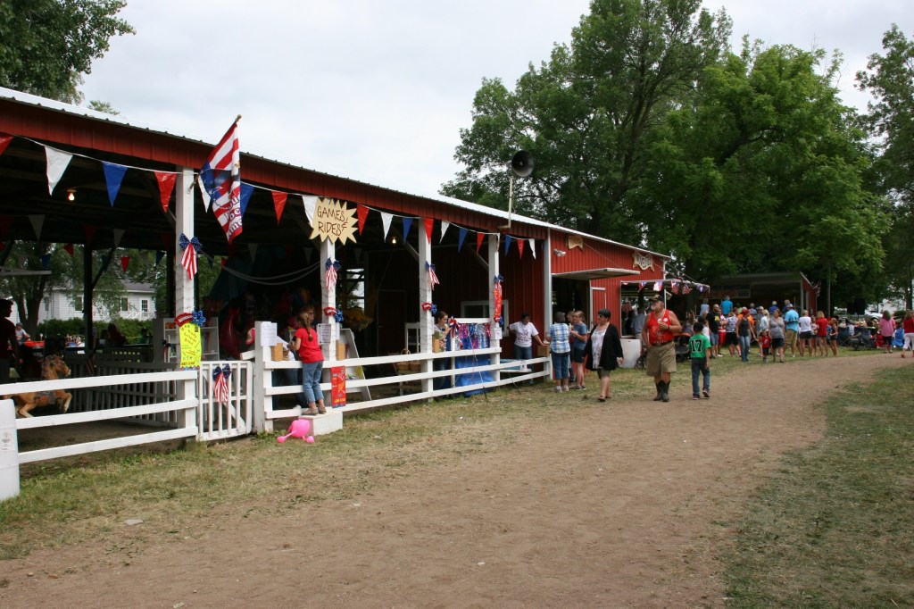 Games, rides and the ticket booth are housed in this red poleshed.