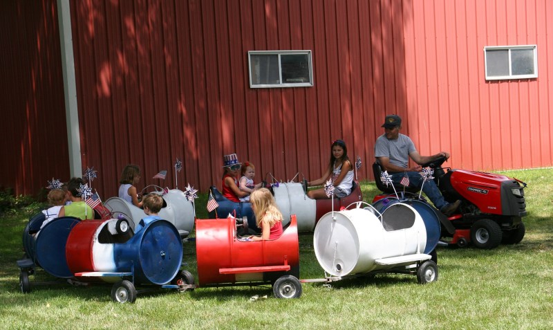 The old-fashioned barrel train draws lots of riders.