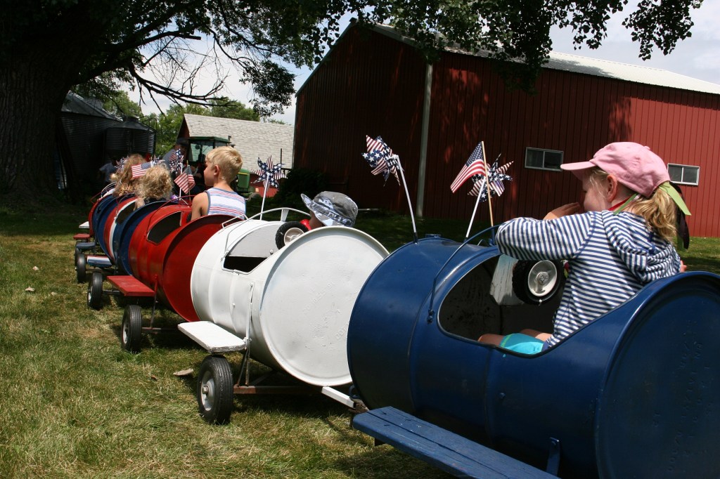 The barrel train chugs away across the lawn.