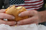 Fourth of July, 6 eating a&nbsp;burger