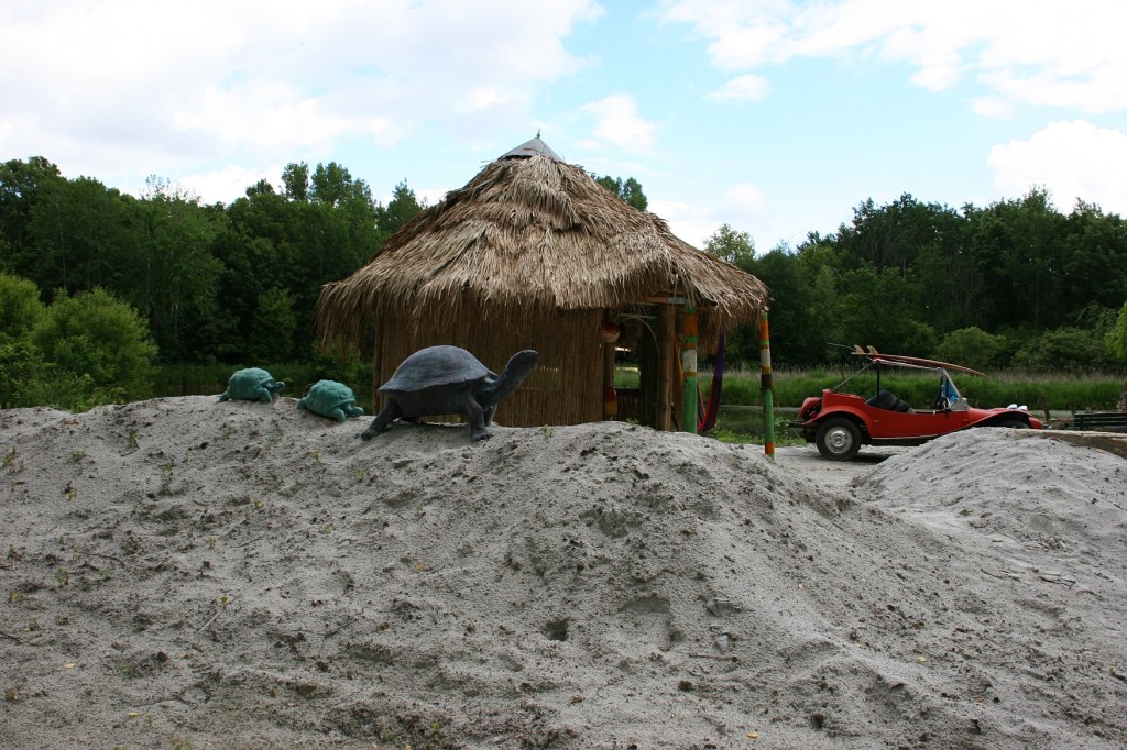 Sand is hauled in to help stage the beach scenes like this cabanna, added since my last visit.