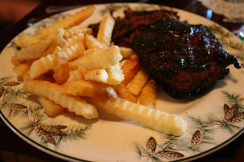 We shared a dinner of barbecued ribs with enough for both of us plus left-overs. I love the pine cone design on the over-sized plates.