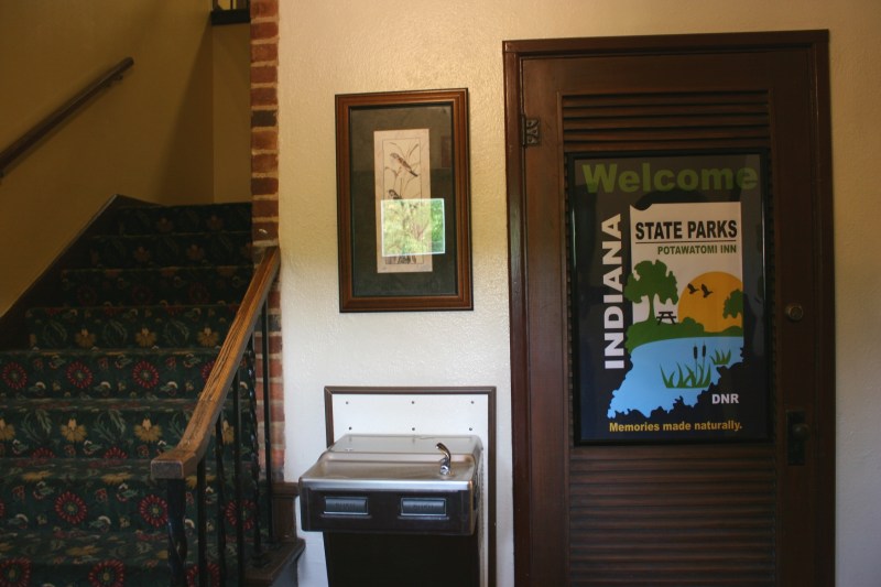 Lovely framed signage inside the entry to the historic section of the inn complex