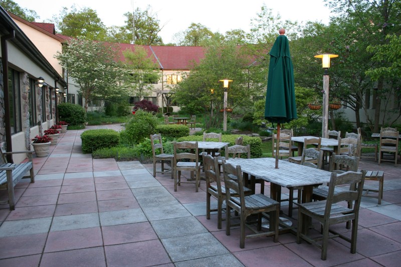 A lovely courtyard filled with plants and with a water feature offers a lovely place to dine outside the Courtyard Cafe.