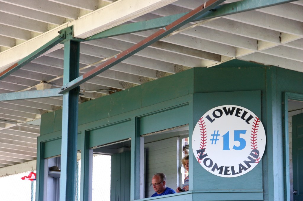 On either side of the announcer's box, I saw barn swallows swoop under the roof.