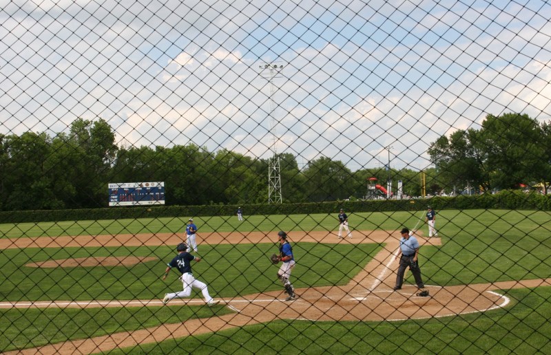 A Montgomery Mallard races toward home plate...