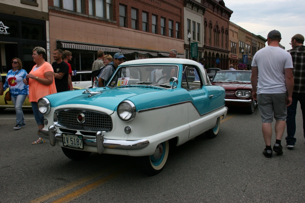 This cute little 1959 Metropolitan drew lots of attention as did its companion one several blocs away.